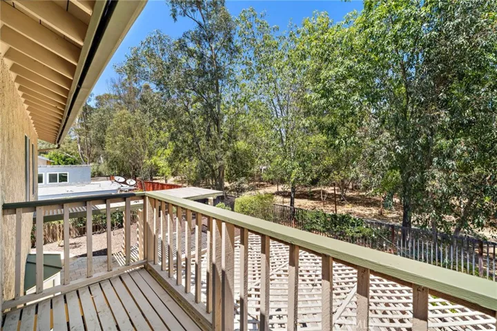 Walking trail and open space runs along the backyard.