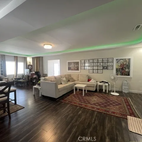 Open concept with custom coffered ceilings, specialty lighting, fully insulated drywall throughout.