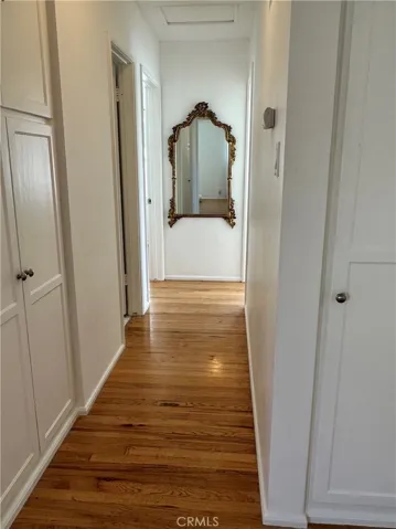 Hallway to bedrooms with lots of storage