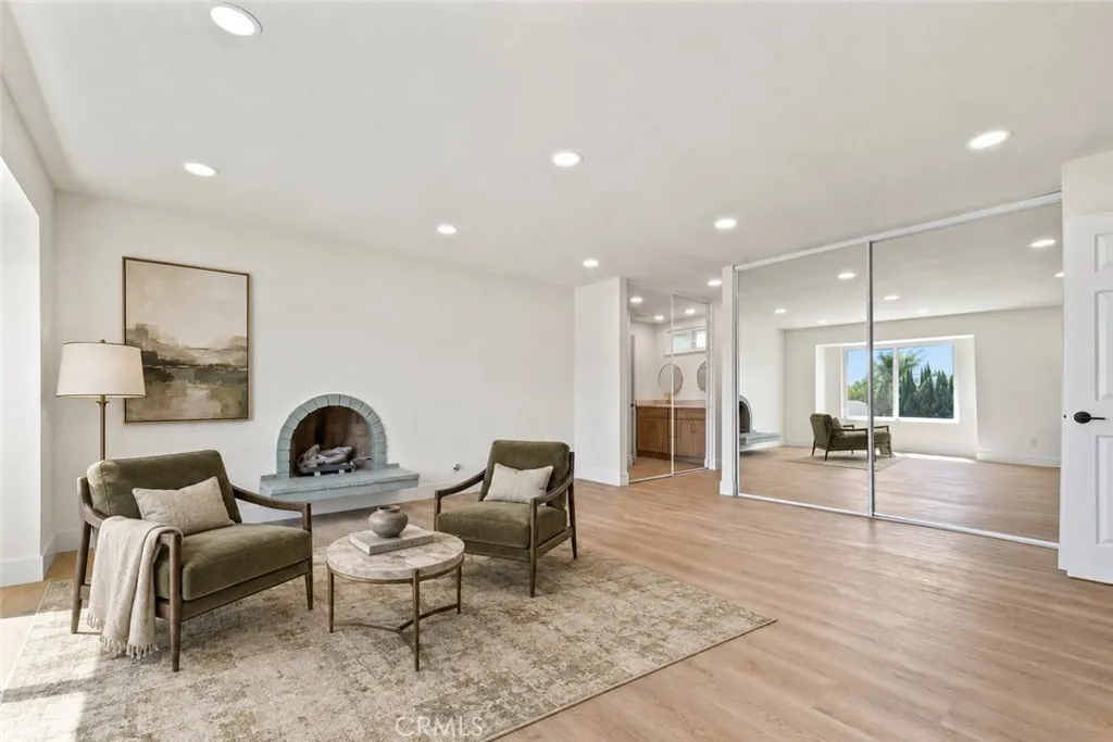Primary Suite with Fireplace - Virtually Staged