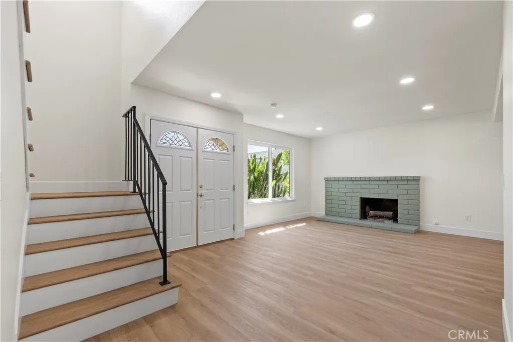 Living room - cozy fireplace and staircase