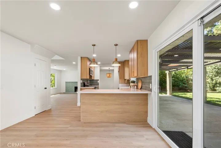 Open room with lovely backyard views