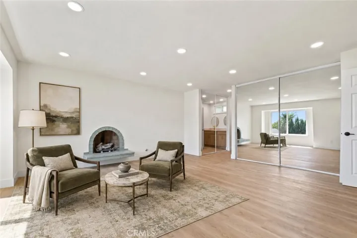 Primary Suite with Fireplace - Virtually Staged