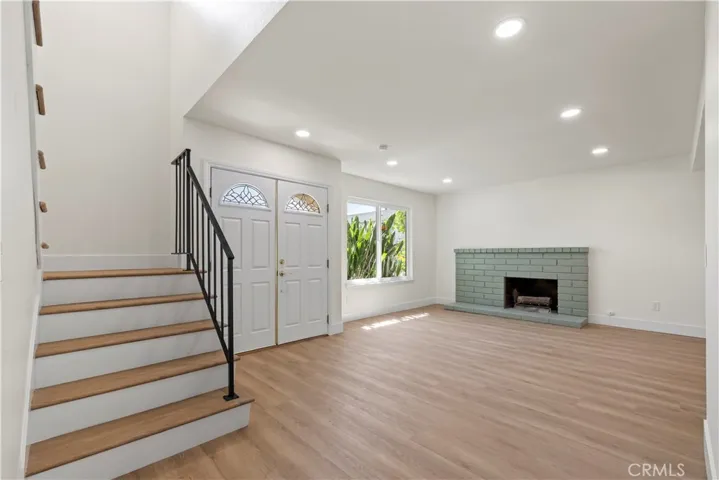 Living room - cozy fireplace and staircase