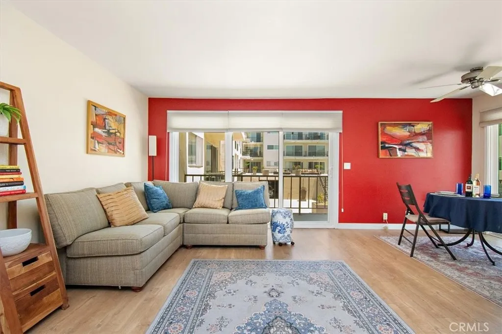 Open floor plan kitchen, dining, balcony, living room