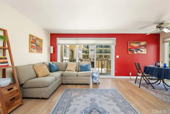 Open floor plan kitchen, dining, balcony, living room