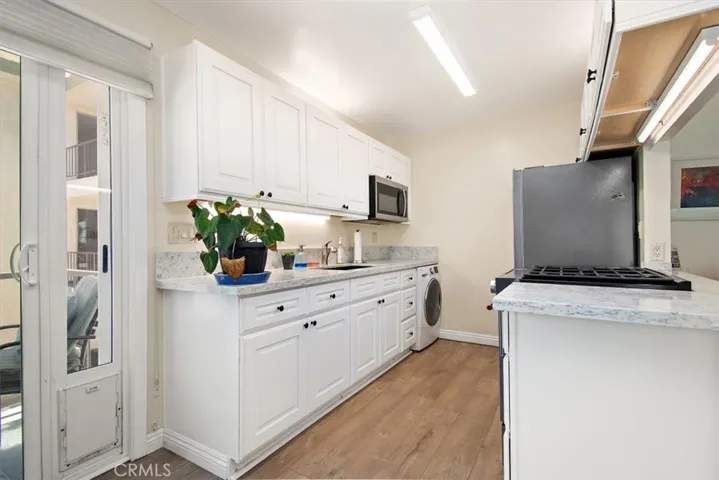 Front-loading washing machine in the kitchen
