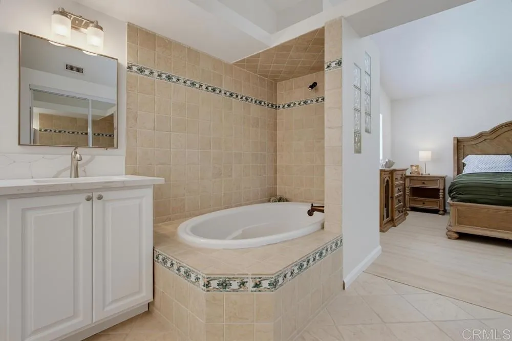 Large soaking tub in primary bathroom