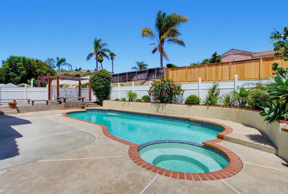 Large patio and fresh landscaping