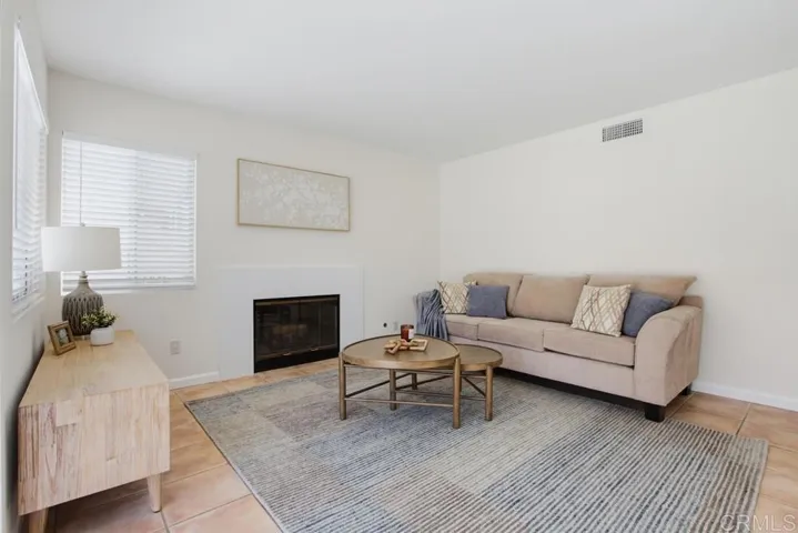 Family Room Features Fireplace for Cozy Nights
