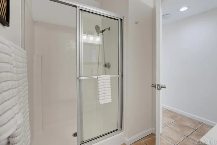 Downstairs bath features step in shower