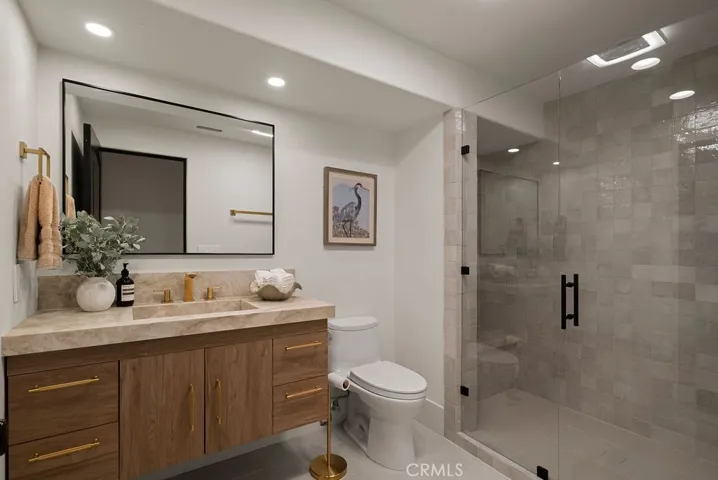 Every bathroom has been beautifully appointed with imported tile, custom stonework, and bespoke millwork, while each secondary bath has been thoughtfully curated to rival the refined elegance of a luxury hotel.