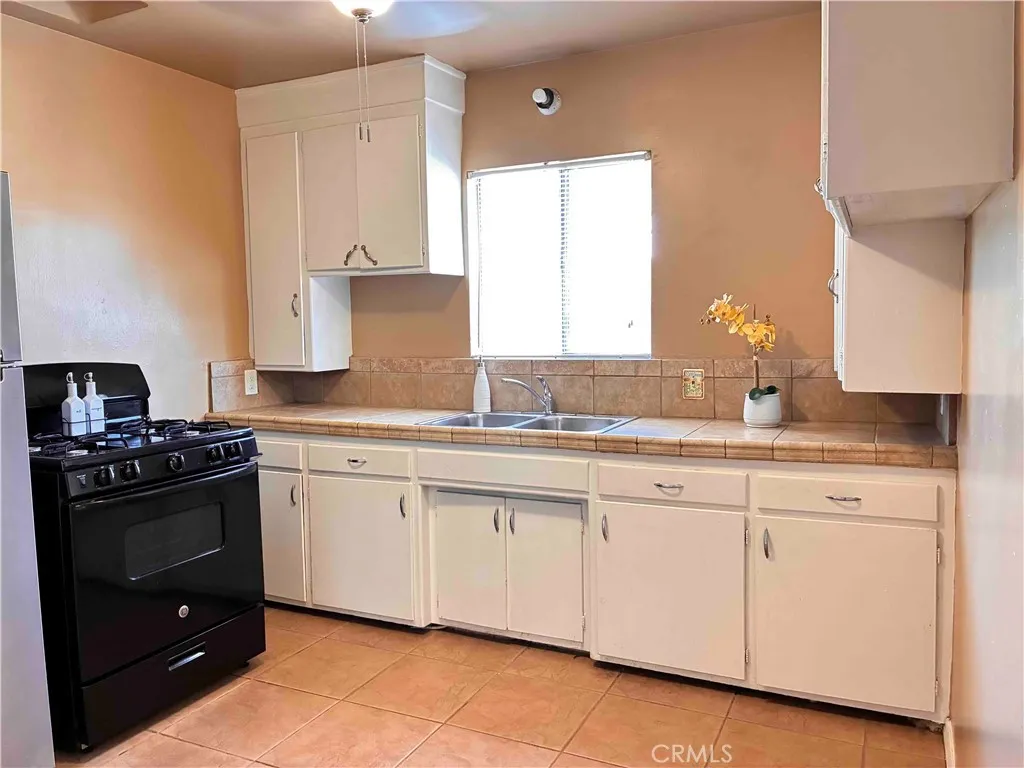 Kitchen includes stove and fridge. No dishwasher or microwave.