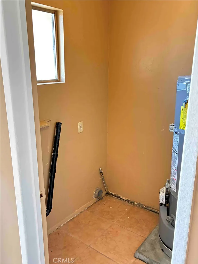 View of laundry room inside unit.
