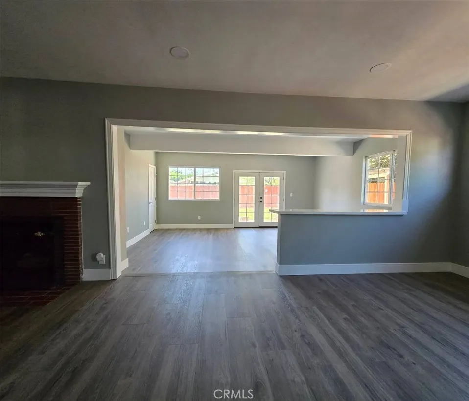 Living space transitions seamlessly into a spacious step-down family/bonus room