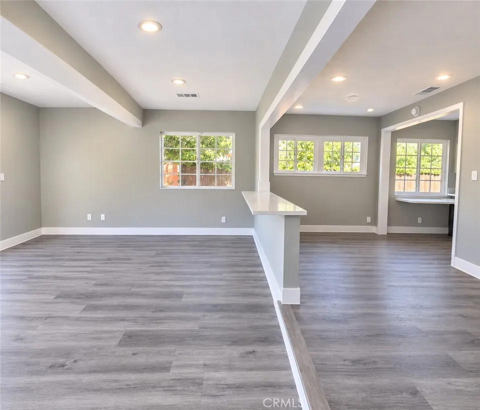 Bonus room conveniently bridged to dining area with versatile floating counter Bonus room conveniently bridged to dining area with versatile floating counter