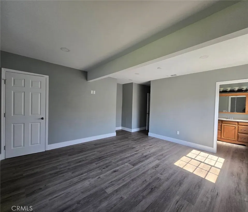 Spacious primary suite conveys privacy and comfort for optimal relaxation