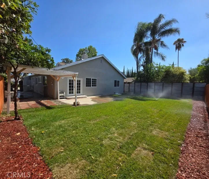 Private backyard with new sod and newly serviced sprinkler system