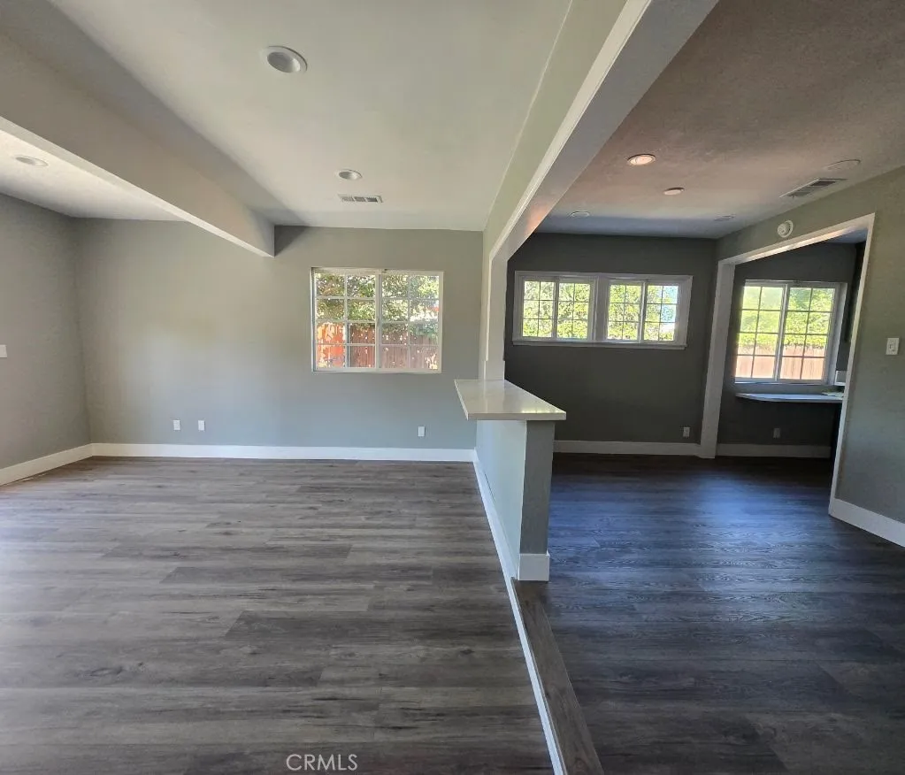 Bonus room conveniently bridged to dining area with versatile floating counter