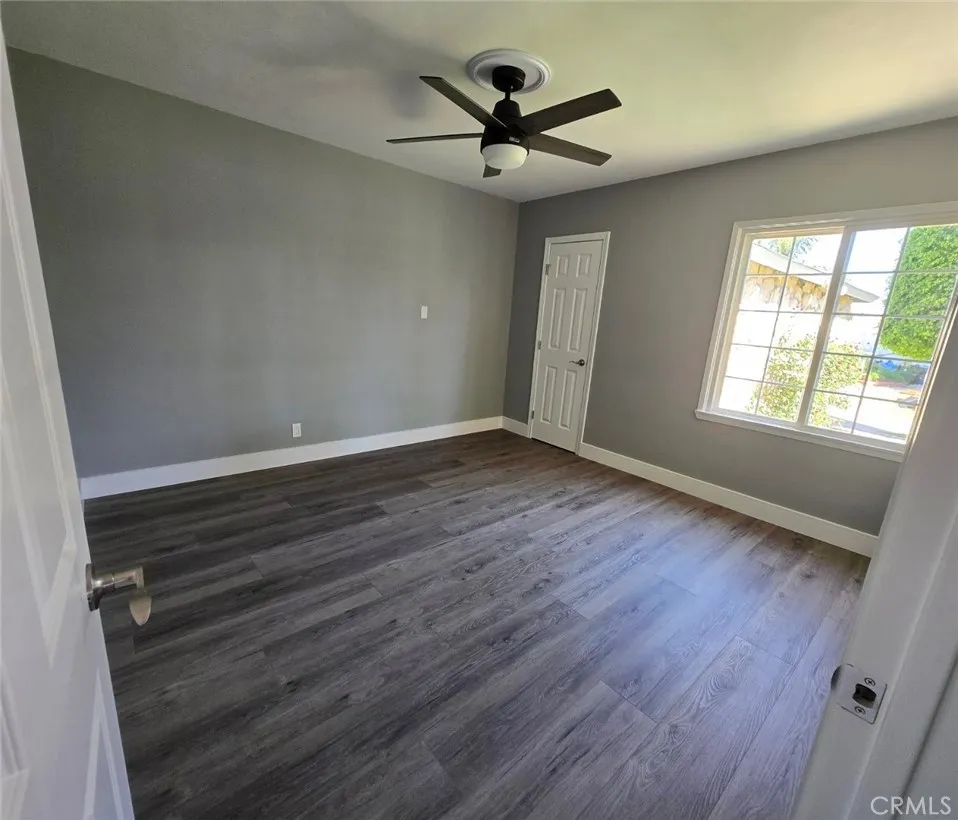 Bedroom 2: Two additional bedrooms provide flexibility for family, guests, a home office, or other changing lifestyle needs, each enhanced with modern ceiling fans for added comfort.
