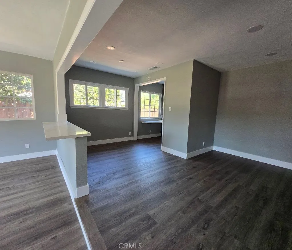 New flooring and plenty of dimmable recessed lights for optimal comfort and flexible illumination
