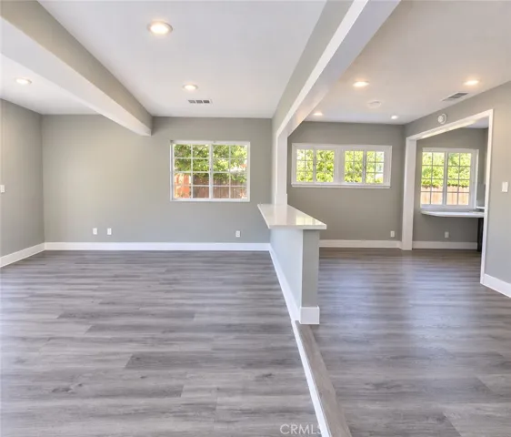 Bonus room conveniently bridged to dining area with versatile floating counter