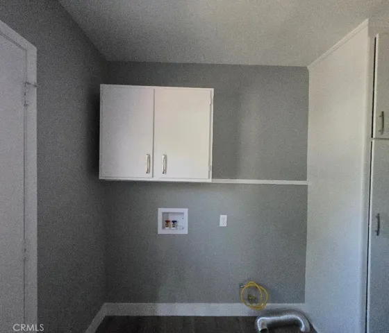 Dedicated laundry room with new laundry hookups