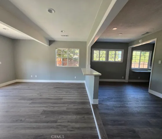 Bonus room conveniently bridged to dining area with versatile floating counter