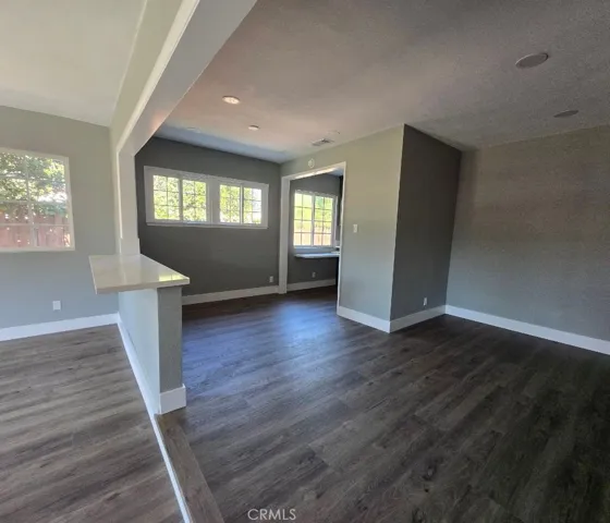 New flooring and plenty of dimmable recessed lights for optimal comfort and flexible illumination