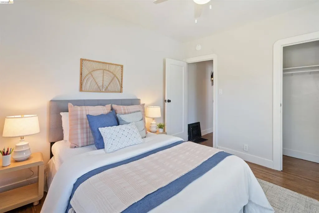 Front bedroom has a ceiling fan, and a closet with a built-in hanging rod