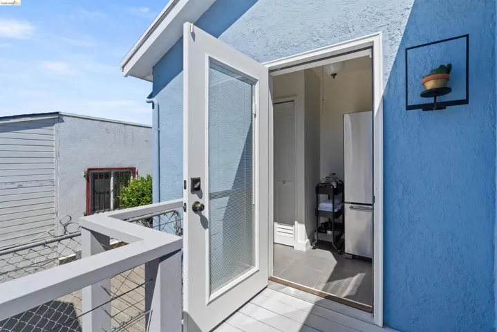 Side porch exists toward garage and back yard.