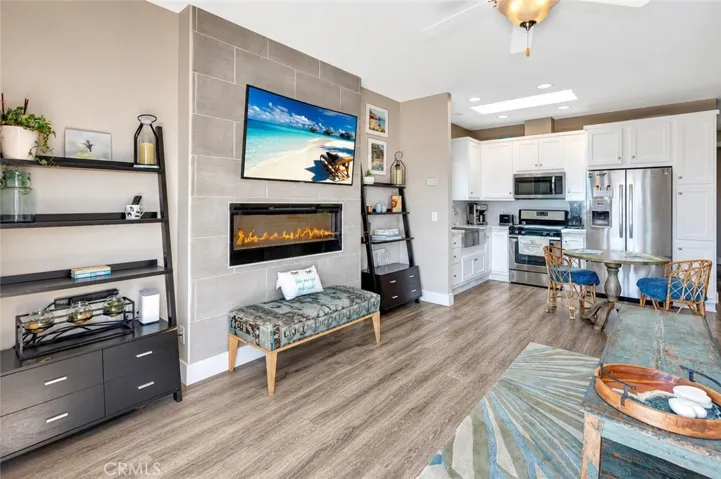 open area between living room and kitchen creating that great room experience