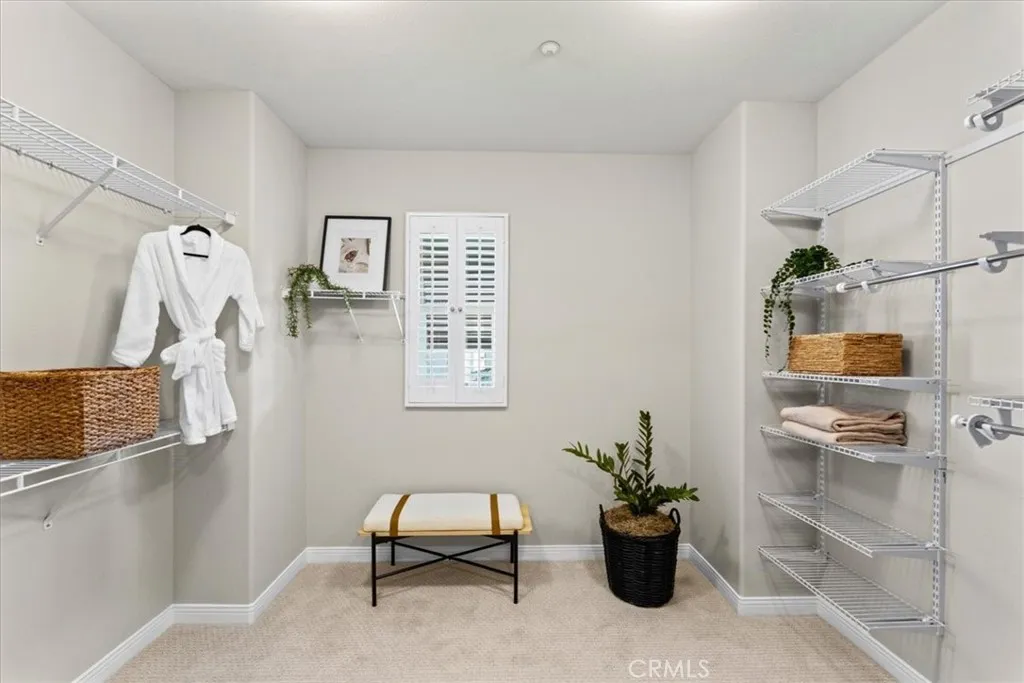 Large walk in closet adjacent to Primary Bedroom Suite