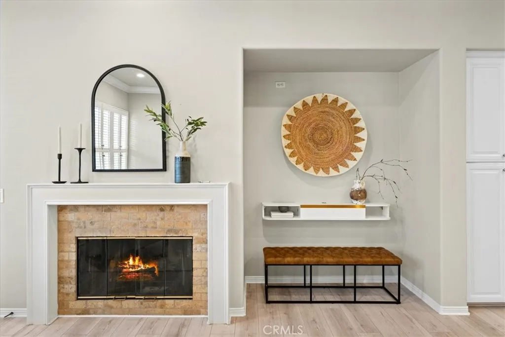 Cozy Fireplace in family room and large TV Niche.