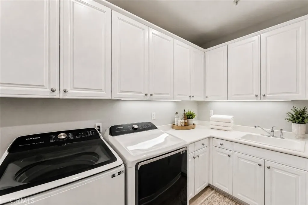 Upstairs Laundry Room with ample storage