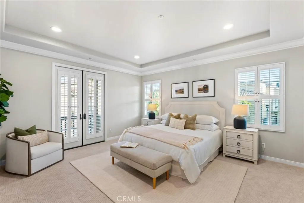 Primary Bedroom with French Doors to walk out deck
