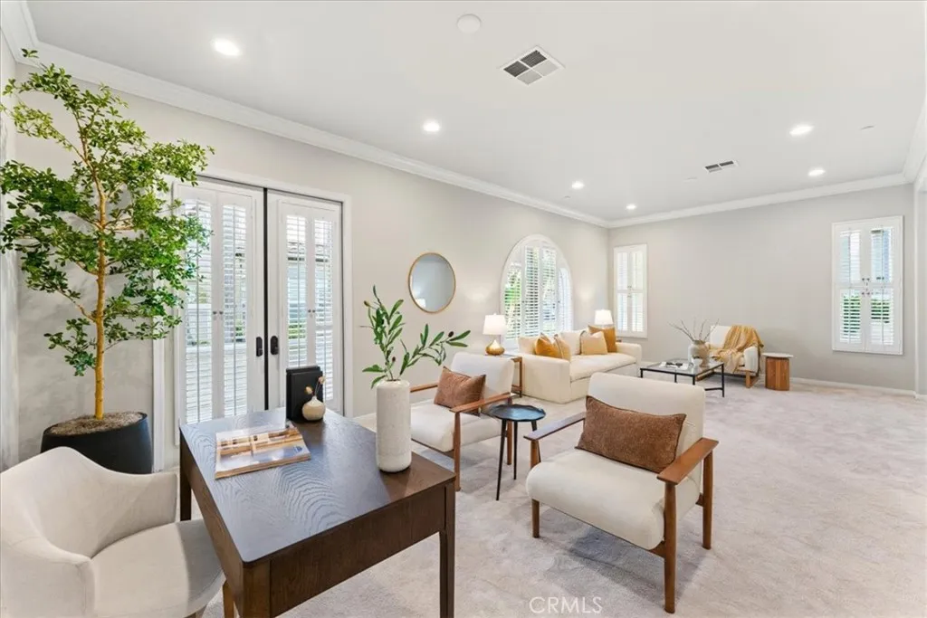 Living Room French Doors open to separate patio area. Very light