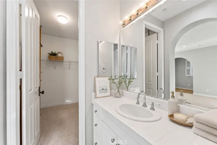 Bathroom 4 (second primary) with walk in closet