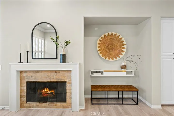 Cozy Fireplace in family room and large TV Niche.