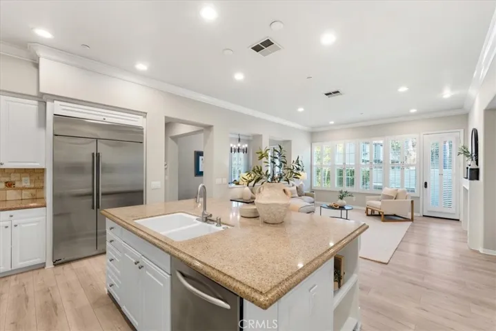 Gourmet Kitchen opens to large light and bright family room