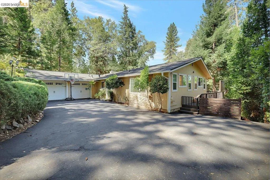 Expansive paved driveway offering ample parking