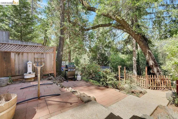 Outdoor patio with paver flooring and gravel sections