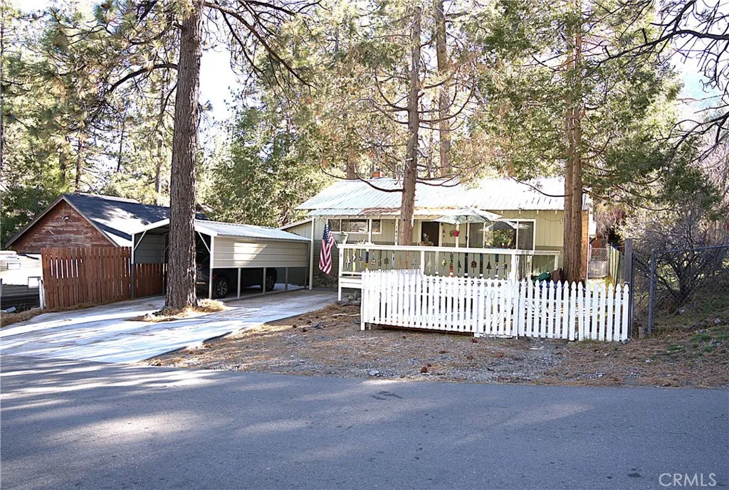 front of house from steet, covered parking