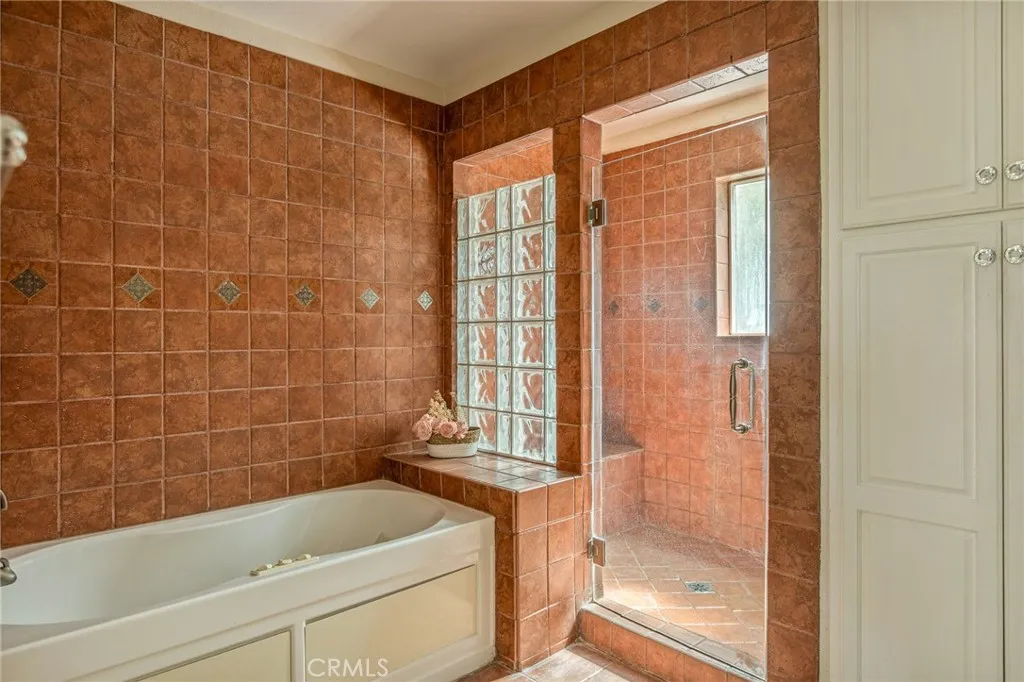Main level primary bath walk in shower.
