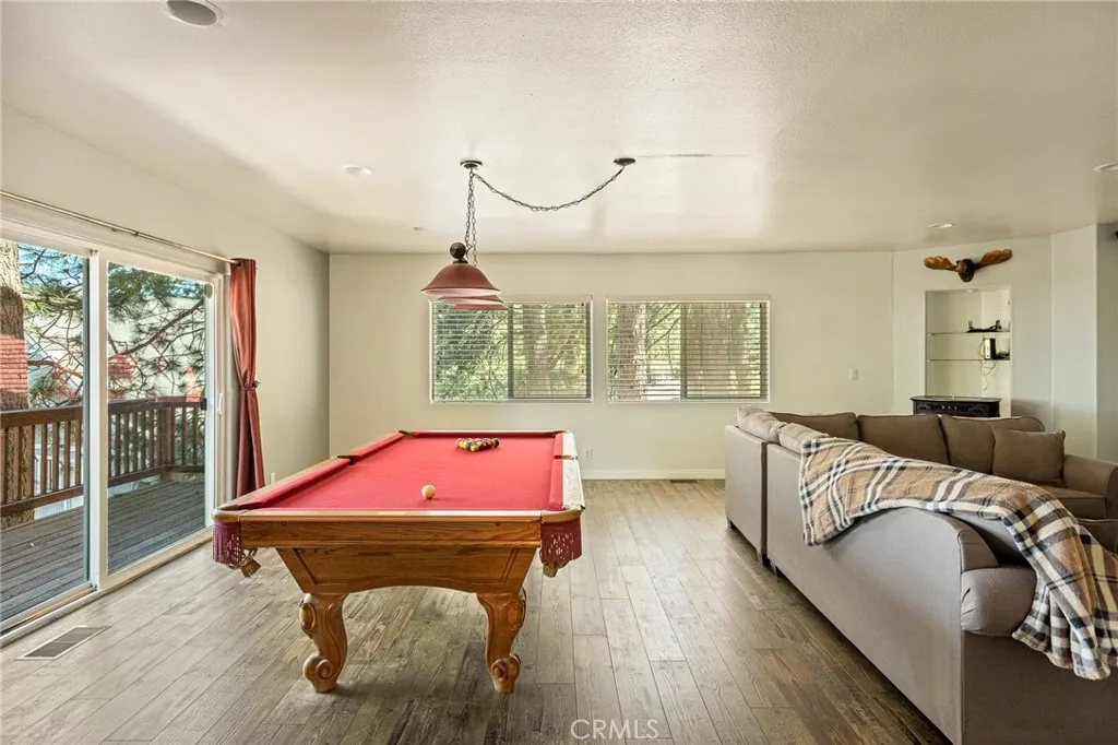 2nd floor family room with access to back deck.