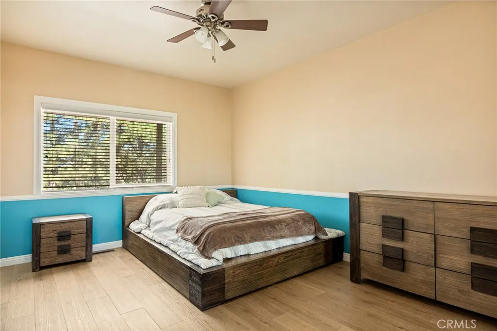Bedroom 4 with ceiling fan.