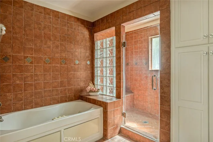 Main level primary bath walk in shower.