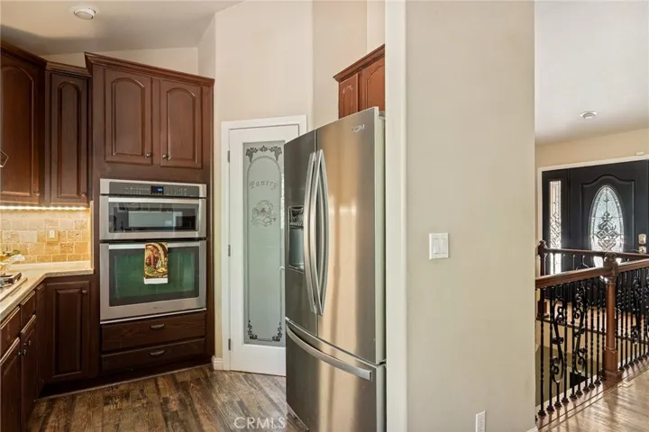 Kitchen with stainless steel appliances.
