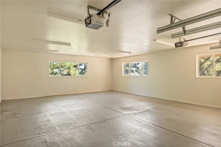 Attached oversized two car garage.