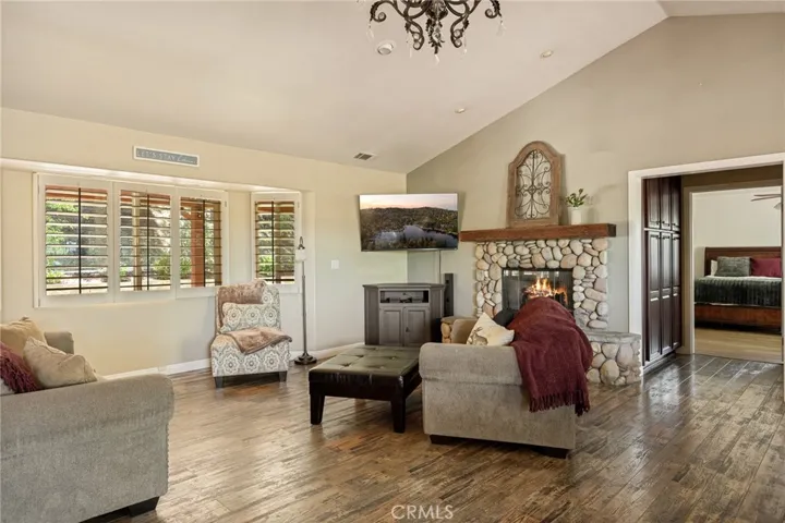 Living room with rock fireplace.